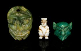 Three Hard Stone Carvings Amulets/Toggles Two of mask form,