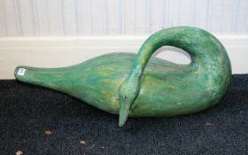 A Life Size Green Painted Wooden Swan, realistically modelled. Length 30 inches.