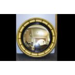 Antique Gilded Circular Convex Mirror Regency style mirror in deep gilt and gesso frame with applied