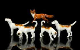 Beswick Foxhound Figures and Fox ( 5 ) In Total. Comprises 1/ Foxhound.