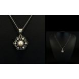 Antique Period White Gold Diamond and Pearl Set Open Worked Pendant of Attractive Form with Later