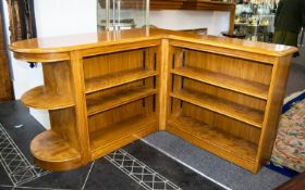 Corner Book Shelf Of Low Form With Four Book Shelves To Underneath. Blonde elm, mid-century style