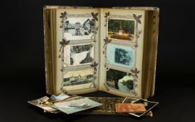 Postcard Album Contains a varied collection of mostly foreign topographical cards, a small selection