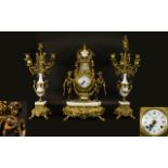 A 20th Century Brass And Marble Cased Clock Garniture In the Louis XV style, the movement by EHS