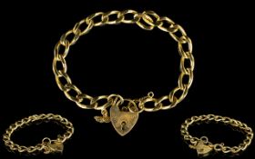 9ct Gold Curb Bracelet with Attached Heart Shaped Padlock. Fully Hallmarked to Padlock and Links.