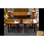 A Set Of Three Teak Coffee Tables Circa 1950's/60's With turned tapering splayed legs with chrome