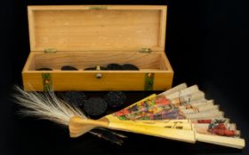 A Decorative Wood Box Containing a Set of Jet Buttons. Rectangular wood box with pansy decoration to