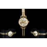 Tissot Ladies - 9ct Gold Cased Mechanical Wrist Watch. c1970's, With Gold Plated Expanding Bracelet.