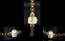 Rotary 9ct Gold Cased - Mechanical Wind Wrist Watch, with 9ct Gold Attached Ornate Bracelet.