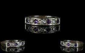 Ladies - Contemporary and Attractive 18ct White Gold Amethyst and Diamond Channel Set Ring.