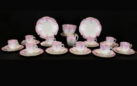 The Foley China Part Tea Set, comprising ten cups, twelve saucers, twelve side dishes, one large