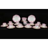 The Foley China Part Tea Set, comprising ten cups, twelve saucers, twelve side dishes, one large