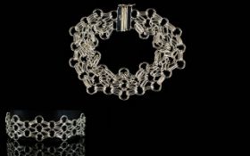 Contemporary Designed Nice Quality and Fancy Silver Bracelet, Interlinked Circles Design.