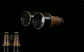 Antique Opera Glasses Large brass opera glasses with brown leather trim, marked to eye cups '