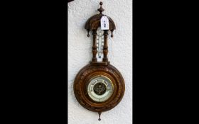 Edwardian Period Well Carved Walnut Banjo Barometer and Thermometer, The Well Shaped Pediment with