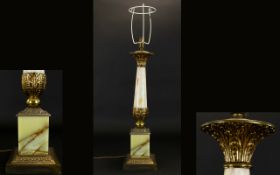 A Contemporary Tall and Impressive Classical Shaped Onyx and Brass Table Lamp, In The Form of a