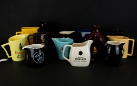 Brewenalia Interest. A Collection of Wade Advertising Jugs (13 in total) Comprising of