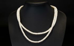 A Double Strand Pearl Necklace with a 9ct Gold clasp. Length 9 inches. Length 9 inches.