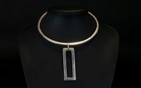 A Vintage Phillipe Audibert Torque Necklace Minimalist style statement necklace in white metal with