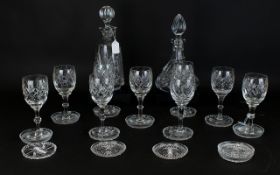 Glass Drinking Set comprising two decanters with stoppers and both with star cut bases, 8 sherry