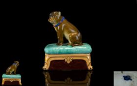 A Late 19th Century Sitzendorf Style Pug Trinket Box In The Form Of A seated Pug On Cushion