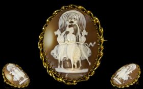 Antique Shell Cameo Brooch A large oval brooch with twisted gilt edge and bar fastening to back,