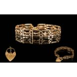 Ladies 9ct Gold 3 Bar Gate Bracelet with Heart Shaped Padlock and Safety Chain.