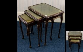 Nest Of 3 Tables with carved apron, Queen Anne legs and tooled leather insert to top with glass