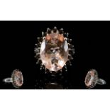 A Morganite Quartz And Brazilian Smoky Quartz Sterling Silver And Platinum Overlay Ring A large