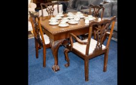 A Victorian Extending Dining Table with two leaves and Gadrooned edge. Together with 6 Chippendale