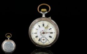 Antique Period - Attractive and Ornate Silver Keyless Open Faced Pocket Watch.