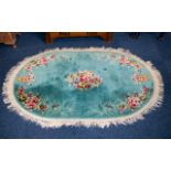 Oval Orinetal Rug Woven rug in Robin's egg blue with orinetal floral design to borders and cotton