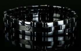 Emperio Armani Designer Bracelet with chunky black set metal links.