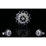 18ct White Gold Sapphire and Diamond Set Cluster Ring. In a Concentric Flower head Setting (