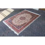 A Large Woven Silk Bokhara Carpet Ornate silk carpet with traditional lozenge and geometric repeat