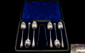 A Boxed Set of Six Silver ' Rat-Tail ' Design Teaspoons with Matching Pair of Silver Sugar Tongs.