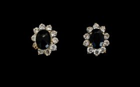 18ct Gold - Pair of Nice Quality Sapphire and Diamond Earrings, In Flower head Design.