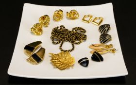 A Collection of 1980's Gold Tone Jewelry To include Napier enamel drop earrings,