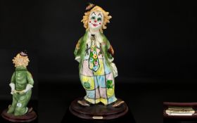 Capodimonte Large Hand Painted Ceramic Clown Figure by Guiolo Cortese, Raised on a Circular Wooden