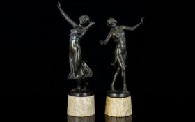 A Fine Pair of Bronze Art Deco Figures of Semi-Clad Female Dancers, Raised on Circular Alabaster