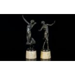 A Fine Pair of Bronze Art Deco Figures of Semi-Clad Female Dancers, Raised on Circular Alabaster