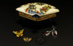 A Ceramic Chinese Trinket Box In The Form Of A Fan Containing Four Items Of Costume Jewellery Cream