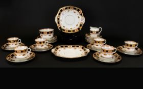 Roslyn China R&C England Part Tea Set. Two sandwich/fruit plates, four cups with saucers, twelve