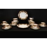 Roslyn China R&C England Part Tea Set. Two sandwich/fruit plates, four cups with saucers, twelve