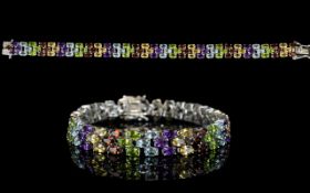 Multi Gemstone Three Row Line Bracelet, oval cuts of amethyst, peridot, red garnet,