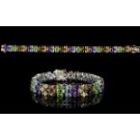 Multi Gemstone Three Row Line Bracelet, oval cuts of amethyst, peridot, red garnet,