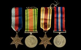 A Collection of World War II Military Medals ( 4 ) In Total. Comprises 1/ The Africa Star. 2/ 1939 -