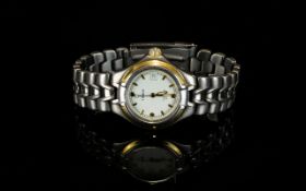 Tissot Titanium T640 Lady Diver 20 ATM Wrist Watch Gold bezel and numerals with cream dial and