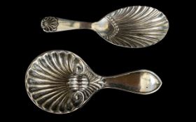 Hallmarked Silver Caddy Spoon In The Regency Style With Fluted Bowl And Shell Terminal.