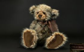 Collectable Large Charlie Bear, With a Decorative Brown Bow & With Suede Paw pads. Striped muzzel